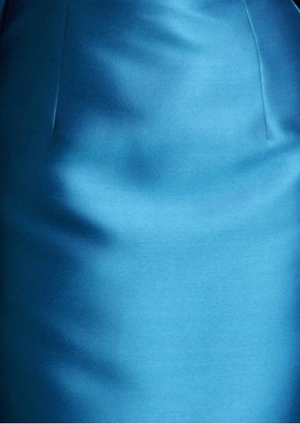 Close-up of a vibrant blue satin gown featuring tailored darts and a smooth, luxurious finish.